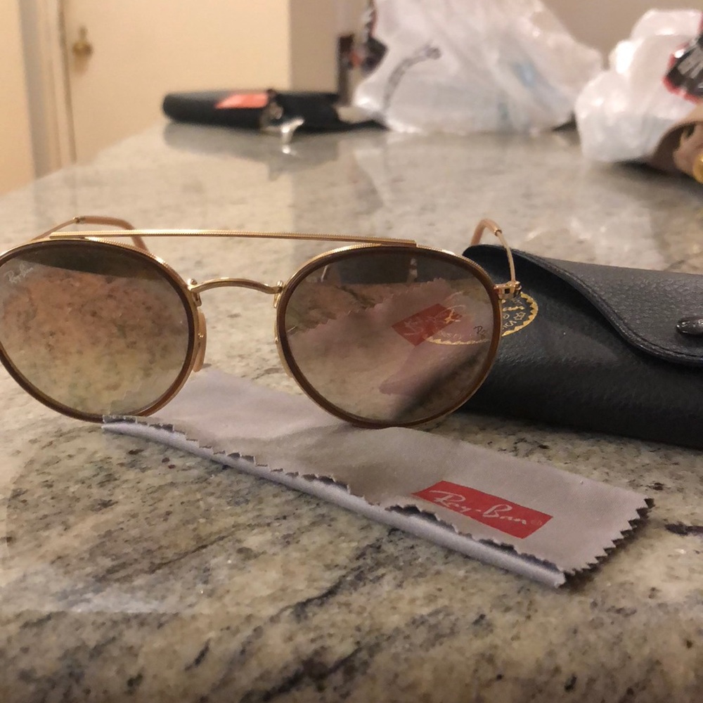 Rose gold and pink tinted circular ray bans